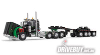 
              DCP by First Gear Black/Green Peterbilt Model 389 Day Cab & ERMC 4-Axle Hydra-Steer Trailer With Bridge Beam Section Load 1/64
            