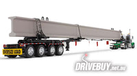 
              DCP by First Gear Black/Green Peterbilt Model 389 Day Cab & ERMC 4-Axle Hydra-Steer Trailer With Bridge Beam Section Load 1/64
            