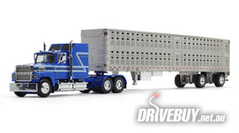 DCP by First Gear Blue/Silver Ford LTL 9000 With 60" Aerodyne Sleeper & Wilson Stockmaster PSAL Livestock Trailer 1/64