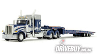 
              DCP by First Gear Rich Blue/Silver Peterbilt Model 389 With 48" Mid-Roof Sleeper & Talbert 5553T Traveling Axle Trailer 1/64
            